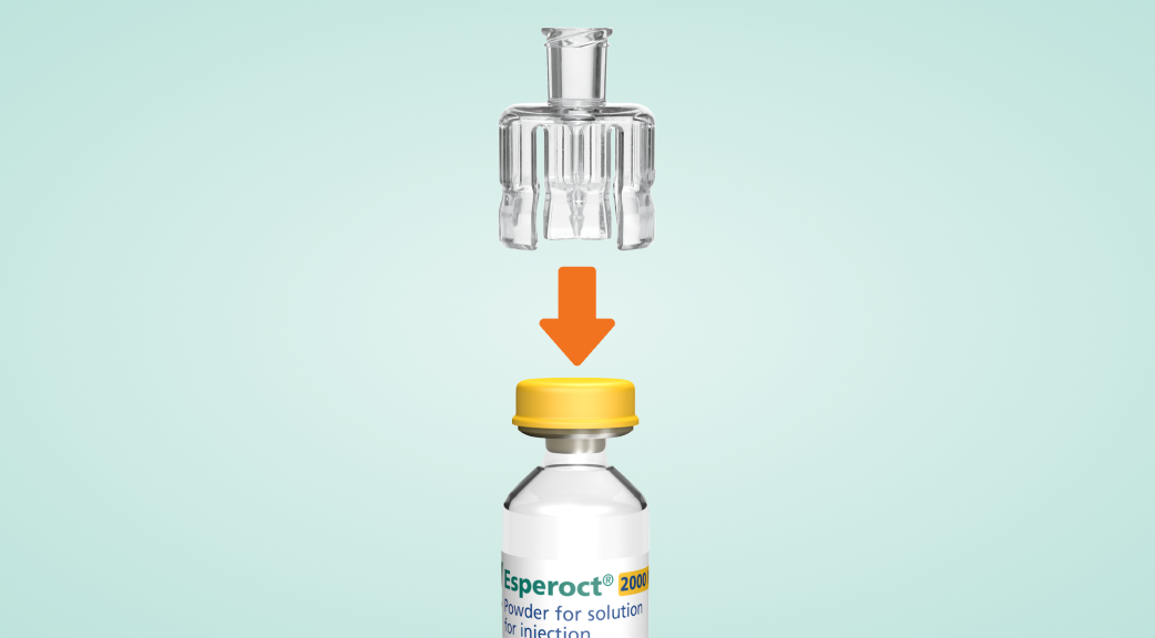 Adapter being attached to a vial